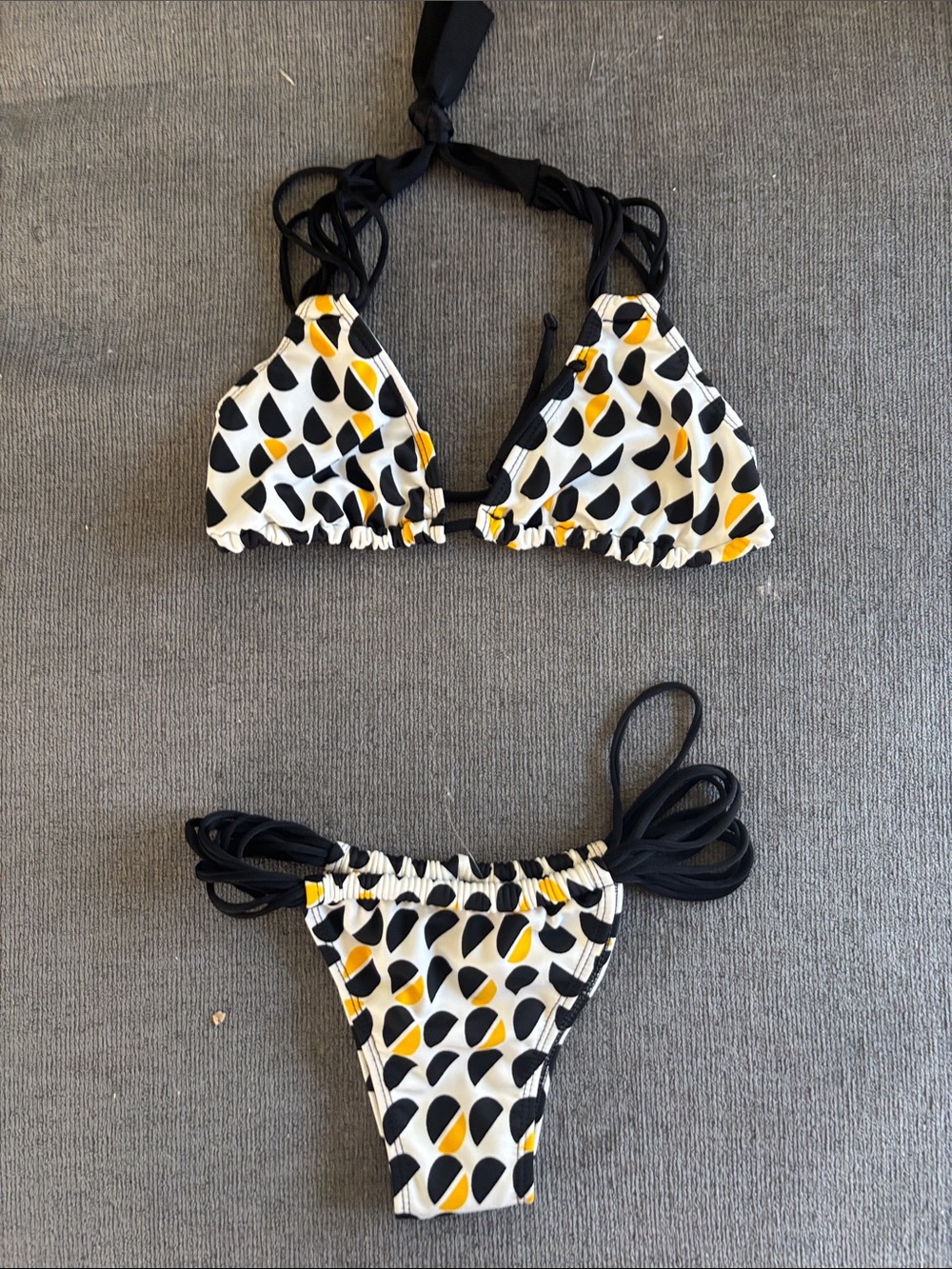 NWOT Guria black and gold string tie set. Size large